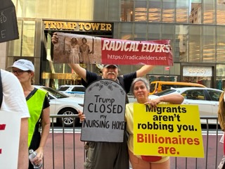 Signs, along with Radical Elders banner, at Trump Tower rally read “Trump closed my nursing home” and “Migrants aren’t robbing you. Billionaires are.”